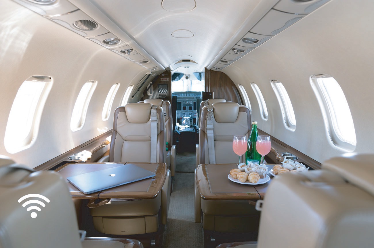 Luxurious private jet cabin interior — premium aviation service